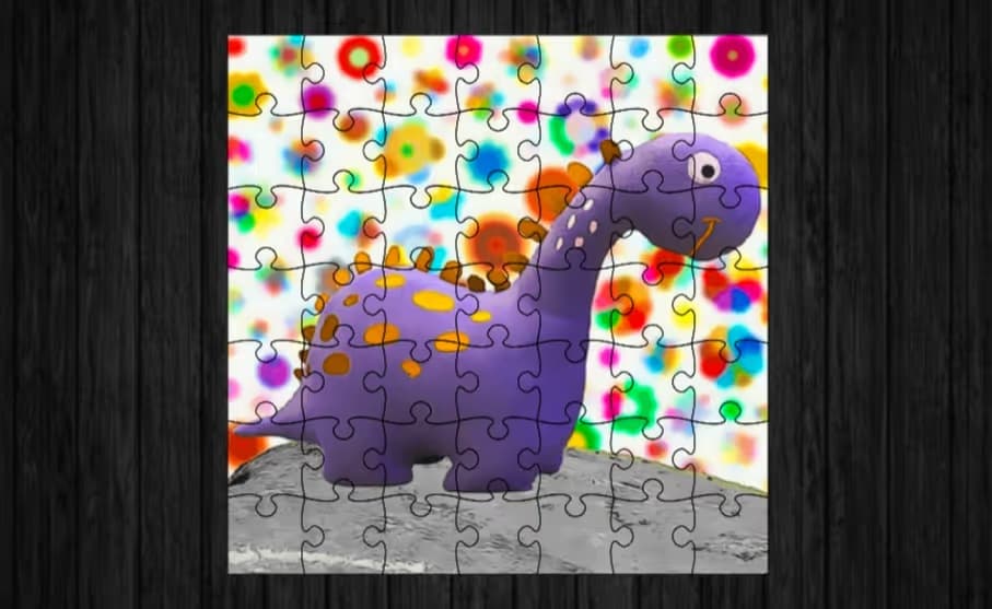 Cute Dinosaur Jigsaw logo